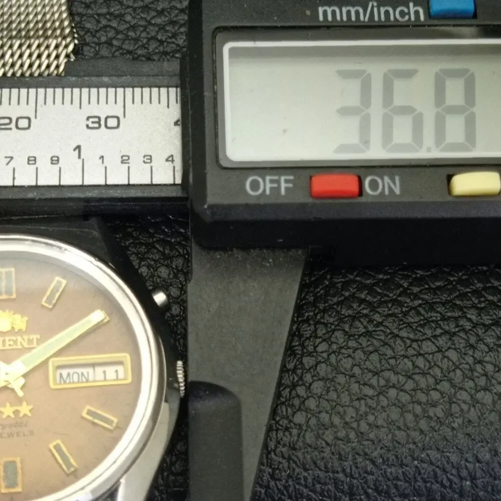 Vintage 1974 Orient Automatic Mens Silver Watch W/daydate & Gold accents